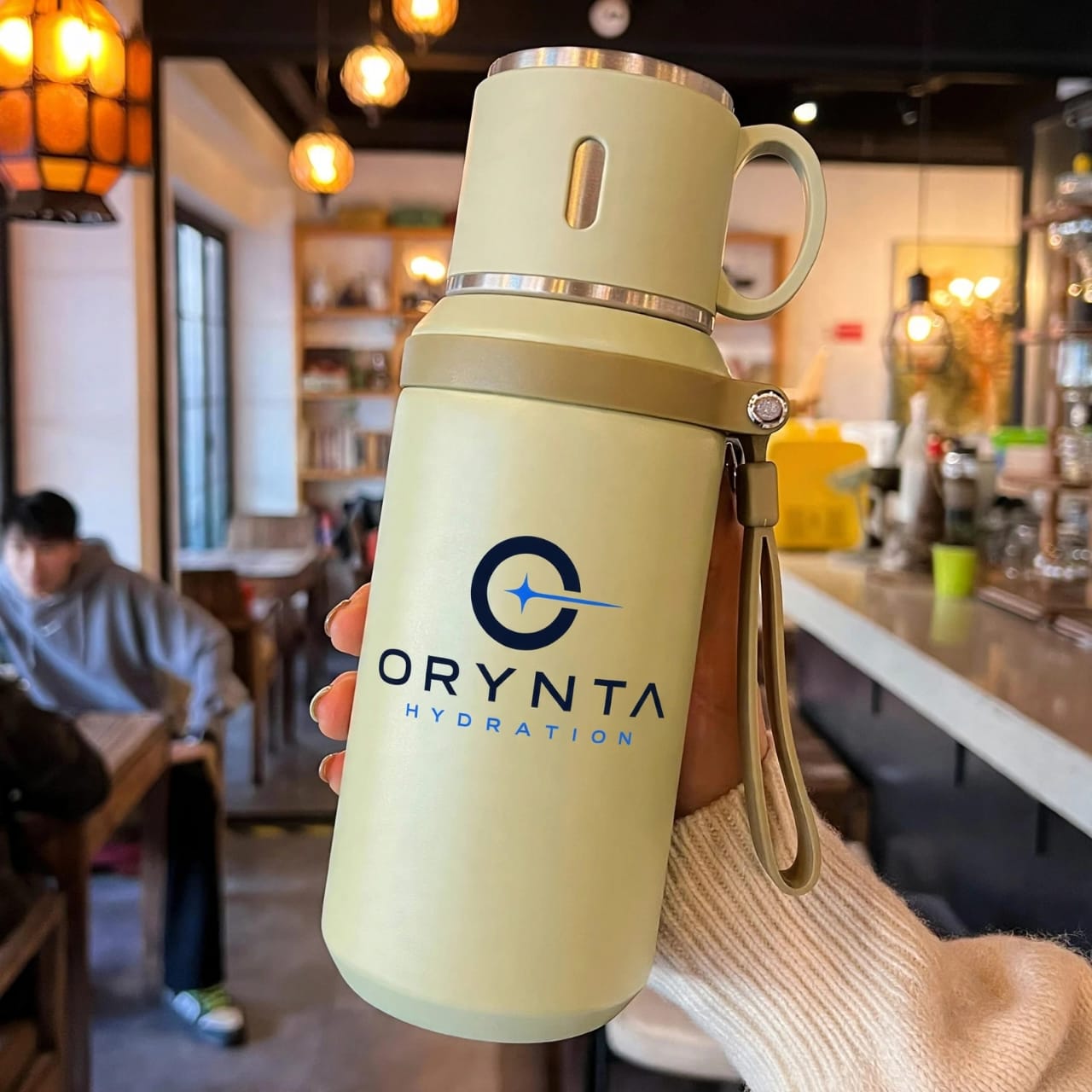 Green ORYNTA TRAVEL insulated travel bottle